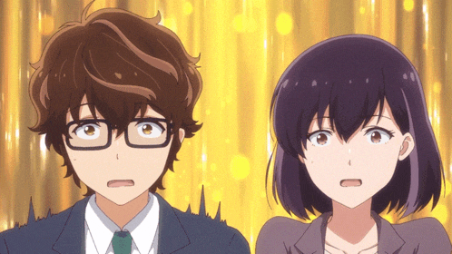 a man and a woman are standing next to each other with their eyes closed