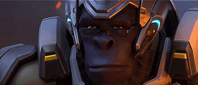 a close up of a gorilla wearing a futuristic helmet