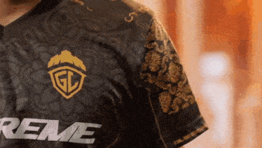 a close up of a person wearing a black shirt that says treme