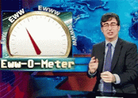 a man in a suit and tie is standing in front of a ew-0-meter sign