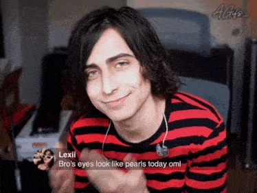 a man wearing a red and black striped shirt has a reply from lexii