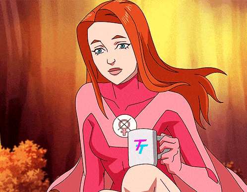 a woman in a pink superhero costume is holding a white mug with a t on it