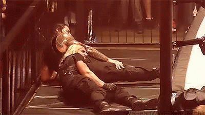 Roman Reigns Seth Rollins GIF - Roman Reigns Seth Rollins Hurt GIFs