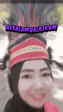 a blurry picture of a woman with the words assalamualaikum written on it