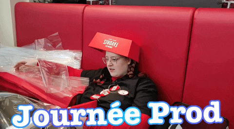 a woman wearing a red hat that says shake 's on it