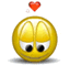 a yellow smiley face with hearts surrounding it on a white background
