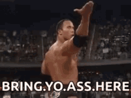 a man in a wrestling ring with the words bring yo ass here above him