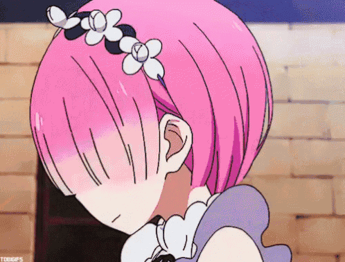a girl with pink hair and white flowers in her hair is making a funny face .