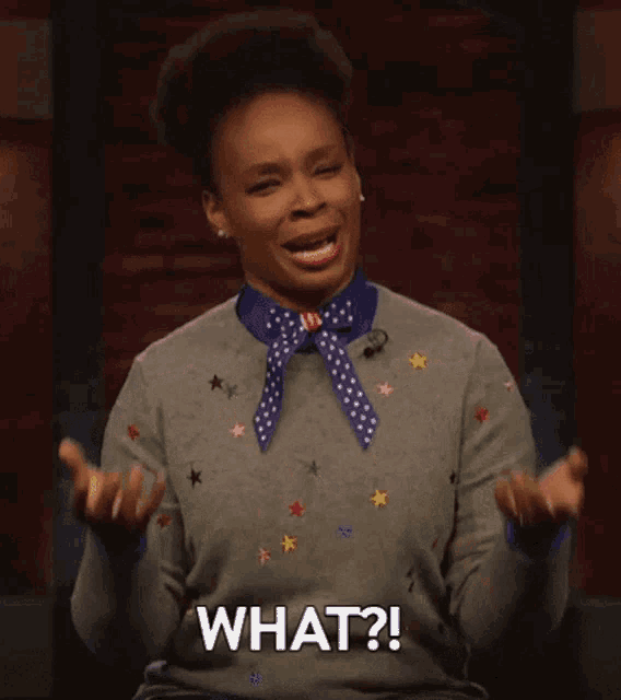 a woman wearing a sweater with stars on it and a bow tie says what ?