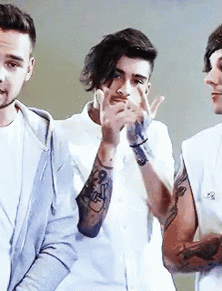 a man with a tattoo on his arm that says ' i love you '
