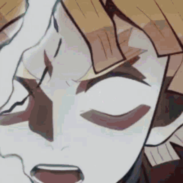 a close up of a man 's face with his eyes closed