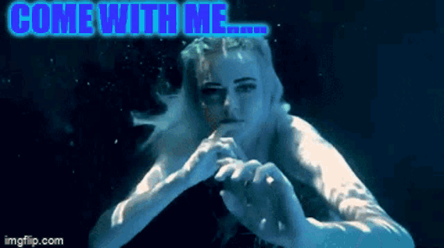 a woman swimming underwater with the words come with me written above her