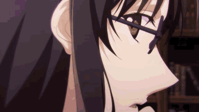 a close up of a person wearing glasses