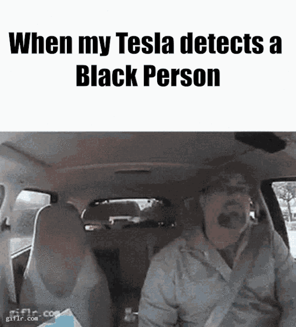 a man is sitting in a car with the words when my tesla detects a black person on the bottom