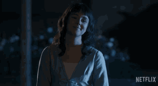 a woman says no in front of a netflix ad