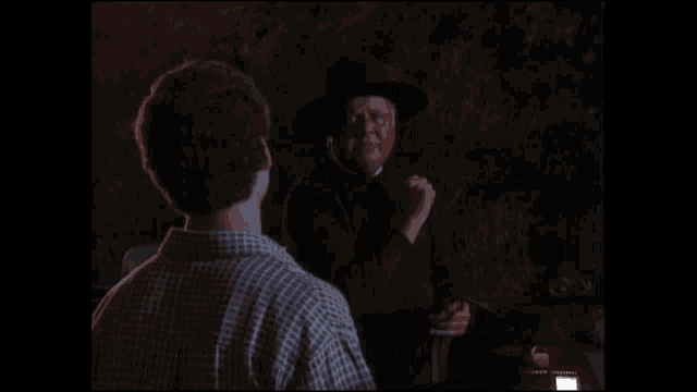 a man talking to another man with the words " my intent was just " on the bottom