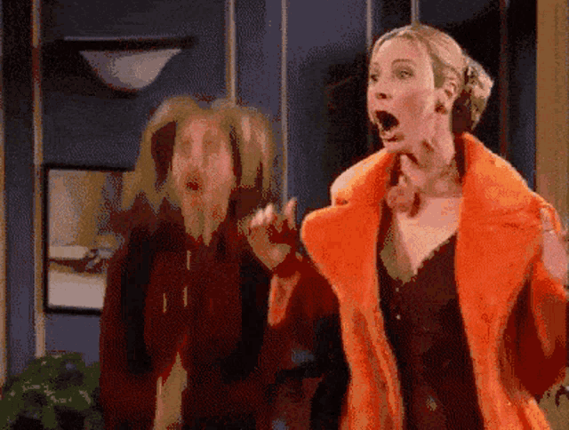 a woman in an orange fur coat is making a surprised face .