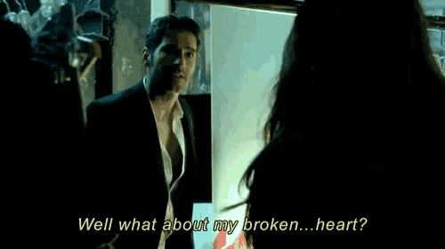a man in a suit is talking to a woman and the words well what about my broken heart