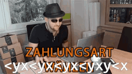 a man wearing a hat and sunglasses is typing on a laptop with zahlungsart written in orange
