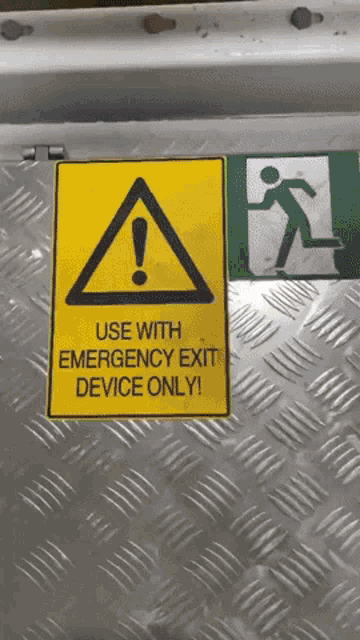 a sign that says use with emergency exit device only on it