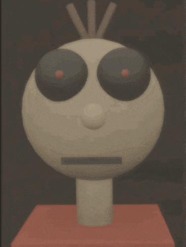 a statue of a cartoon character with a crown on top of his head