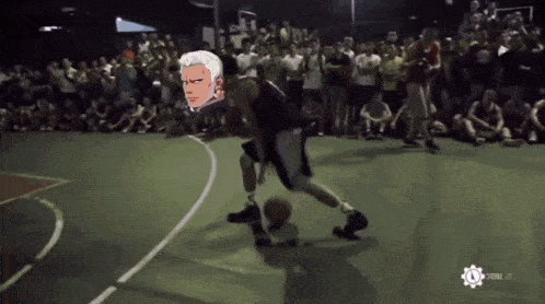a basketball game is being played in front of a crowd with a watermark that says ' nba.com ' on it