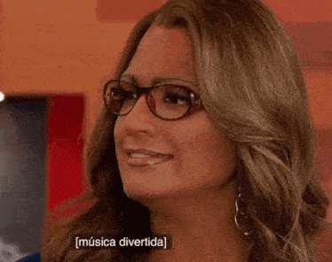 a woman wearing glasses and a wig is making a face .