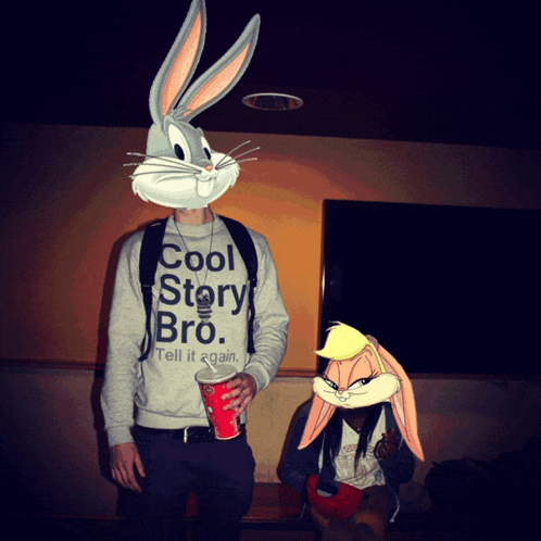 a man wearing a cool story bro sweatshirt stands next to a woman wearing a bugs bunny mask