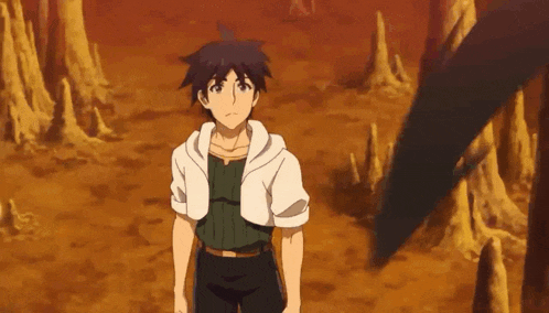 a man is standing in the middle of a desert with a sword in his hand .