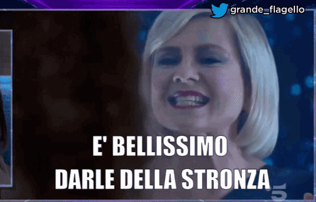 a woman is smiling with the words e ' bellissimo darle della stronza