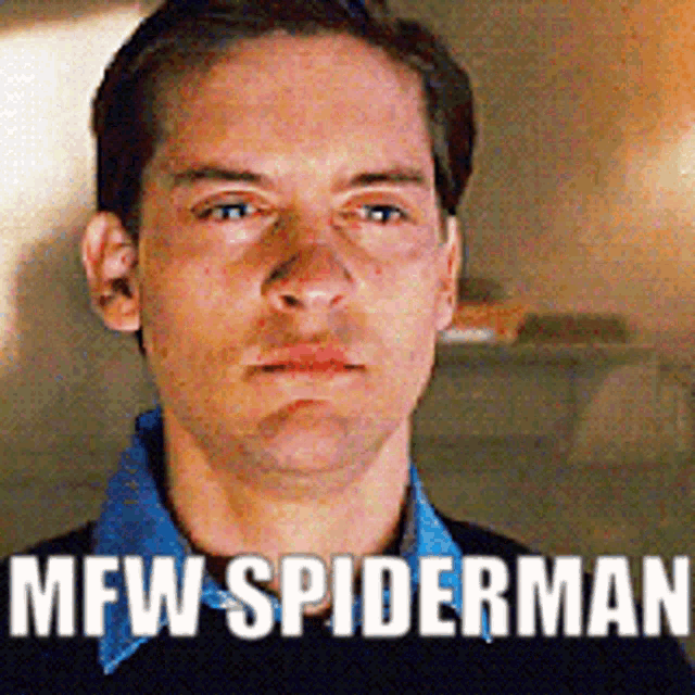 a close up of a man 's face with the words mfw spiderman below him