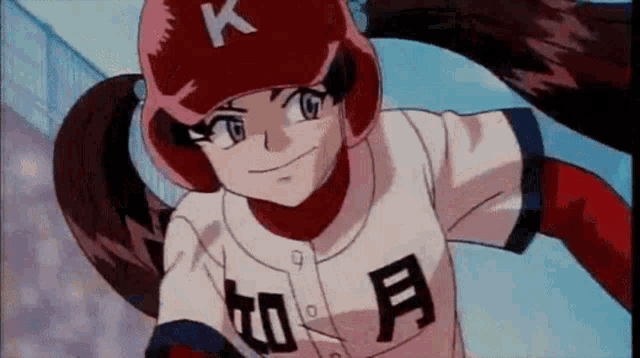a girl is wearing a baseball uniform and a helmet .