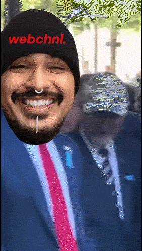 a man wearing a hat that says webchnl on it