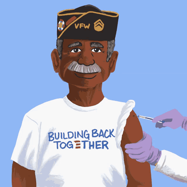 a man wearing a shirt that says building back together is getting a vaccine