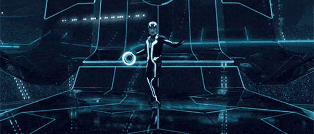 a man in a futuristic suit is standing in front of a circle