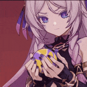 a girl with purple nails is holding a yellow ball in her hands