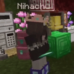 a minecraft character is standing next to a green block and a pink flower .