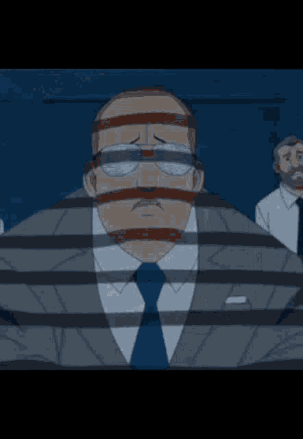 a man in a suit and tie with glasses on his face is behind bars