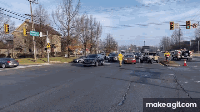 make a gif.com is displayed at the bottom of a busy intersection