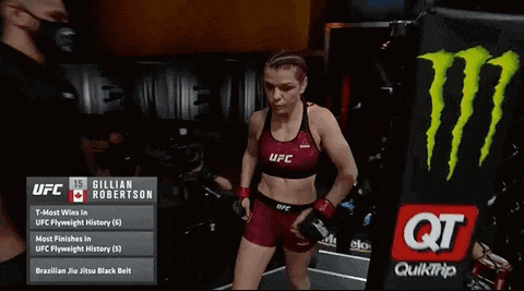 a female fighter named gillian robertson is in a ring