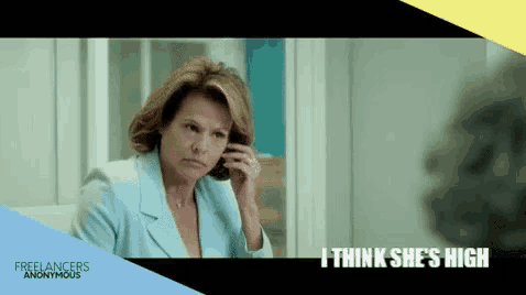 a woman talking on a phone with the words i think she 's high written below her