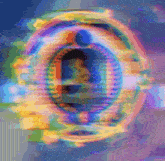 a blurry picture of a rainbow colored circle with a person in it