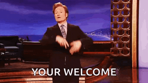 a man in a suit and tie is dancing on a stage with the words `` your welcome '' .