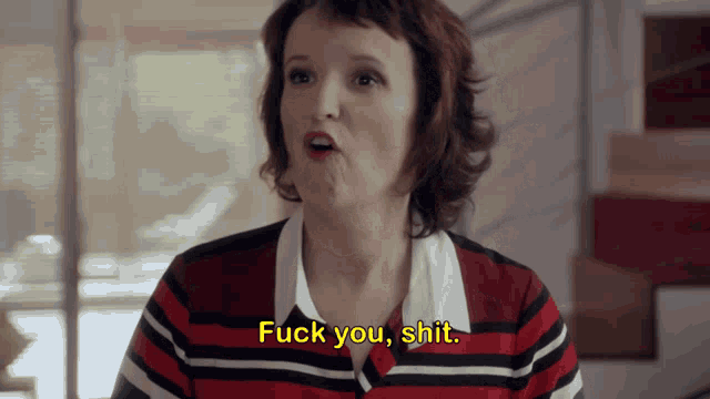 a woman in a red and white striped shirt says " fuck you shit "