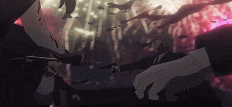 a man in a suit and tie is holding a gun in a dark room