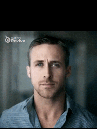 a close up of a man 's face with the words made with revive below him
