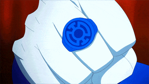 a close up of a person 's arm with a blue logo on it