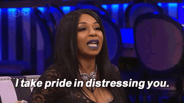a woman with purple lipstick is saying i take pride in distressing you