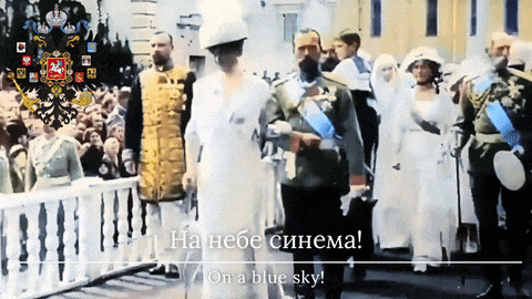 a group of people walking in front of a crowd with the words on a blue sky