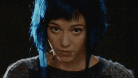 a woman with blue hair has the words hey hot stuff on her face